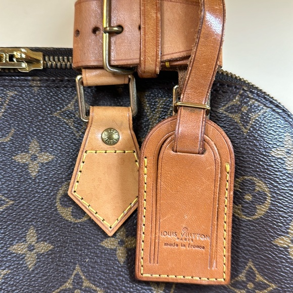 Louis Vuitton Accessories - Louis Vuitton petite leather luggage tag and poignet Rare